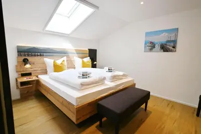 Ein Bett oder Betten in einem Zimmer der Unterkunft Seethal-Alpenrand