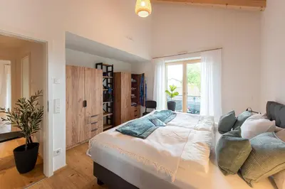 Ein Bett oder Betten in einem Zimmer der Unterkunft Ferienhaus Chiemseefeeling