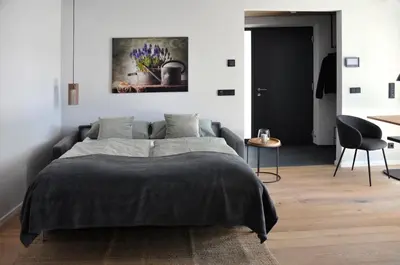 Ein Bett oder Betten in einem Zimmer der Unterkunft DIE NEUN - Loft, Garten, Lieblingsort