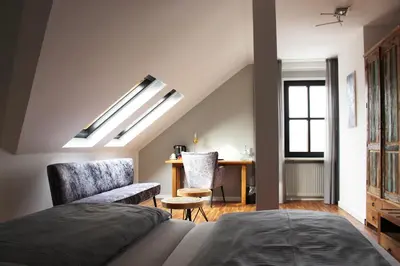 Ein Bett oder Betten in einem Zimmer der Unterkunft ARTHOTEL Herrsching