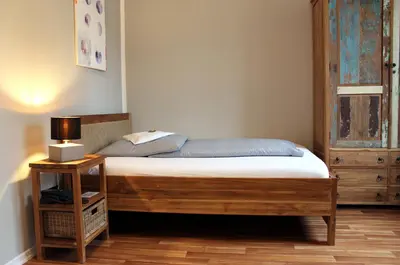 Ein Bett oder Betten in einem Zimmer der Unterkunft ARTHOTEL Herrsching