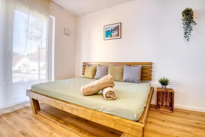 Ein Bett oder Betten in einem Zimmer der Unterkunft Design Apartment Bavaria - Küche, Smart-TV & Mehr