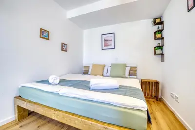 Ein Bett oder Betten in einem Zimmer der Unterkunft Design Apartment Bavaria - Küche, Smart-TV & Mehr