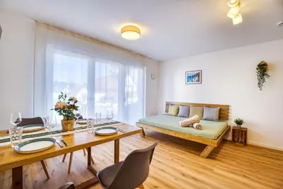 Ein Sitzbereich in der Unterkunft Design Apartment Bavaria - Küche, Smart-TV & Mehr