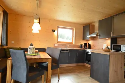 Küche/Küchenzeile in der Unterkunft Jägar Chalet - Feriendorf Via Claudia Haus 73