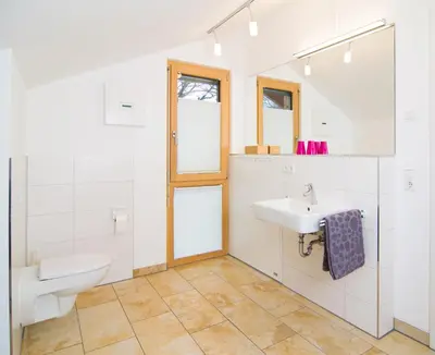 Ein Badezimmer in der Unterkunft Ammersee Lodge
