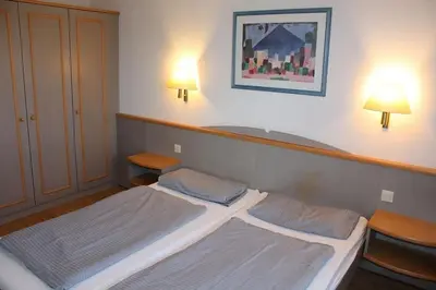 Ein Bett oder Betten in einem Zimmer der Unterkunft Ferienhaus Nr 120, Kategorie Komfort, Feriendorf Hochbergle, Allgäu