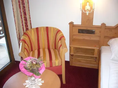 Ein Bett oder Betten in einem Zimmer der Unterkunft Alpenhotel Pfaffenwinkel