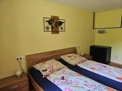 Ein Bett oder Betten in einem Zimmer der Unterkunft Landhaus Anni