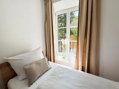 Ein Bett oder Betten in einem Zimmer der Unterkunft ma suite - city sol apartment - centrum - private parking