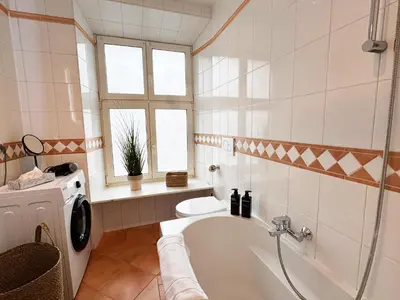 Ein Badezimmer in der Unterkunft ma suite - city sol apartment - centrum - private parking