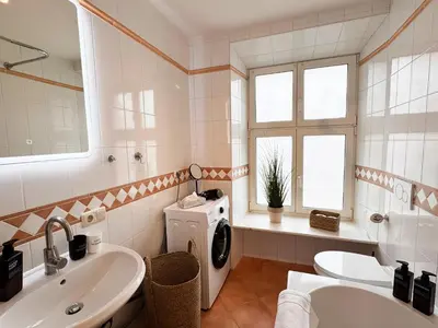 Ein Badezimmer in der Unterkunft ma suite - city sol apartment - centrum - private parking