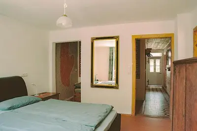 Ein Bett oder Betten in einem Zimmer der Unterkunft Ferienwohnung in Seenaehe