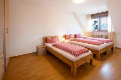 Ein Bett oder Betten in einem Zimmer der Unterkunft Land & Erlebnis Apartment im Allgäu