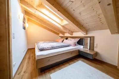 Ein Bett oder Betten in einem Zimmer der Unterkunft Eli's Bergjuwel