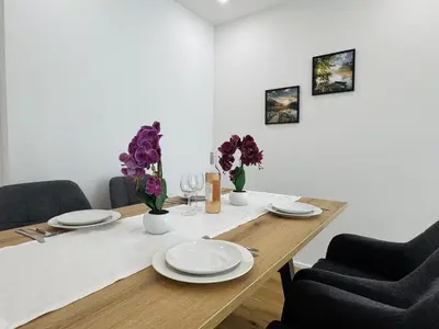 Grundriss der Unterkunft AVINORA Modernes Apartment mit Balkon zwischen Chiemsee und Kampenwand