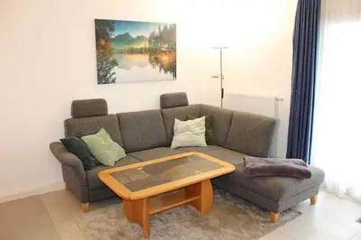 Ein Sitzbereich in der Unterkunft Ferienhaus Nr 114, Kategorie Komfort, Feriendorf Hochbergle, Allgäu