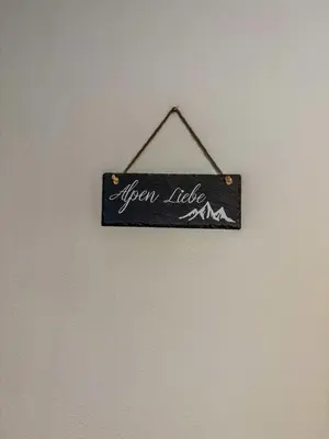 Ein Zertifikat, Auszeichnung, Logo oder anderes Dokument, das in der Unterkunft Ferienwohnung Rauszeit ausgestellt ist