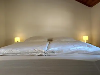 Ein Bett oder Betten in einem Zimmer der Unterkunft Haus Zwerchstum Übersee