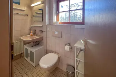 Ein Badezimmer in der Unterkunft ChiemseeFreude