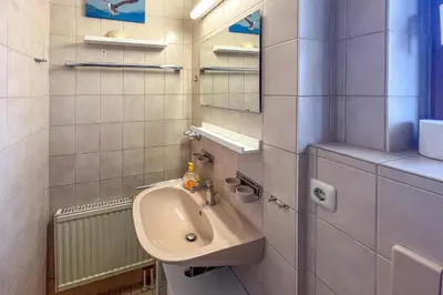 Ein Badezimmer in der Unterkunft ChiemseeFreude