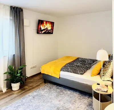 Ein Bett oder Betten in einem Zimmer der Unterkunft Apartment in Zentrumsnähe NETFLIX SELF CHECK-IN