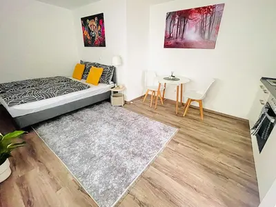 Ein Bett oder Betten in einem Zimmer der Unterkunft Apartment in Zentrumsnähe NETFLIX SELF CHECK-IN