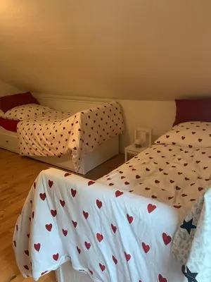 Ein Bett oder Betten in einem Zimmer der Unterkunft Ferienwohnung Schatzkisterl