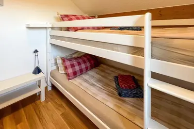 Ein Bett oder Betten in einem Zimmer der Unterkunft Chiemsee Auszeit