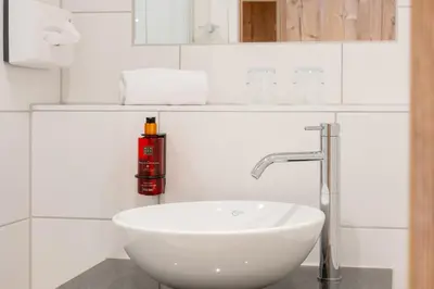 Ein Badezimmer in der Unterkunft snooze apartments Holzkirchen