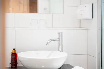 Ein Badezimmer in der Unterkunft snooze apartments Holzkirchen