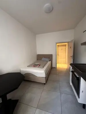 Ein Bett oder Betten in einem Zimmer der Unterkunft A&B Ferienwohnungen