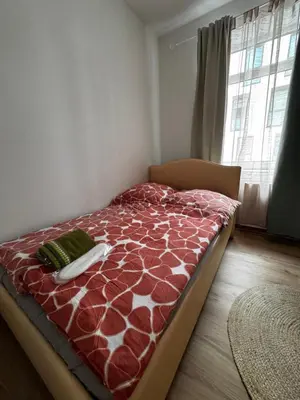 Ein Bett oder Betten in einem Zimmer der Unterkunft A&B Ferienwohnungen