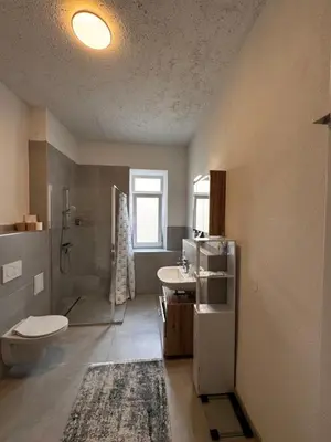 Ein Badezimmer in der Unterkunft A&B Ferienwohnungen