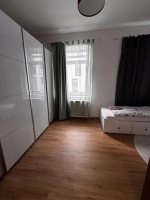 Ein Bett oder Betten in einem Zimmer der Unterkunft A&B Ferienwohnungen