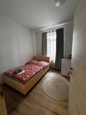 Ein Bett oder Betten in einem Zimmer der Unterkunft A&B Ferienwohnungen