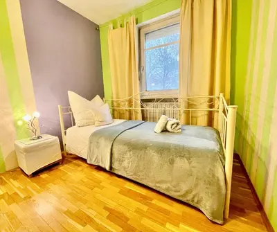 Ein Bett oder Betten in einem Zimmer der Unterkunft Charmante Bleibe für Alleinreisende