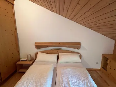 Ein Bett oder Betten in einem Zimmer der Unterkunft Ferienwohnung Zellerhorn Kerscher