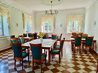 Ein Sitzbereich in der Unterkunft Schloss Elmischwang