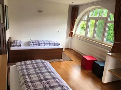 Ein Bett oder Betten in einem Zimmer der Unterkunft Haus Seefried Buch am Ammersee