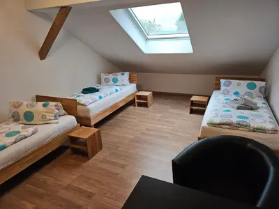 Ein Bett oder Betten in einem Zimmer der Unterkunft Ferienwohnungen März