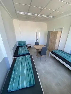 Ein Bett oder Betten in einem Zimmer der Unterkunft Munich Bedrooms