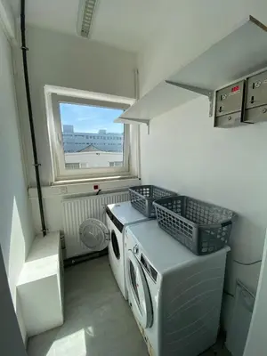 Ein Sitzbereich in der Unterkunft Munich Bedrooms