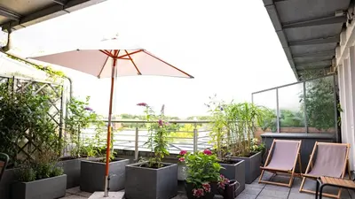 Ein Garten an der Unterkunft Munich City Rooftop Apartment