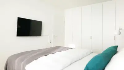 Ein Bett oder Betten in einem Zimmer der Unterkunft Munich City Rooftop Apartment