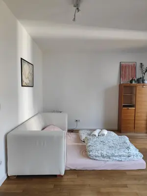Ein Bett oder Betten in einem Zimmer der Unterkunft Avea - Accessible Downtown Retreat near Hofgarten