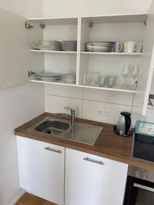 Küche/Küchenzeile in der Unterkunft Wohnung mit Garagenplatz am Obinger See