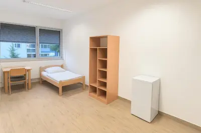 Ein Bett oder Betten in einem Zimmer der Unterkunft NonStop Home