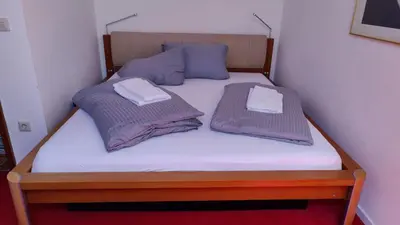 Ein Bett oder Betten in einem Zimmer der Unterkunft Abendsonne