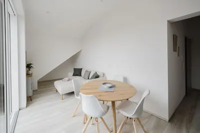 Ein Sitzbereich in der Unterkunft Mangfalltal Studios